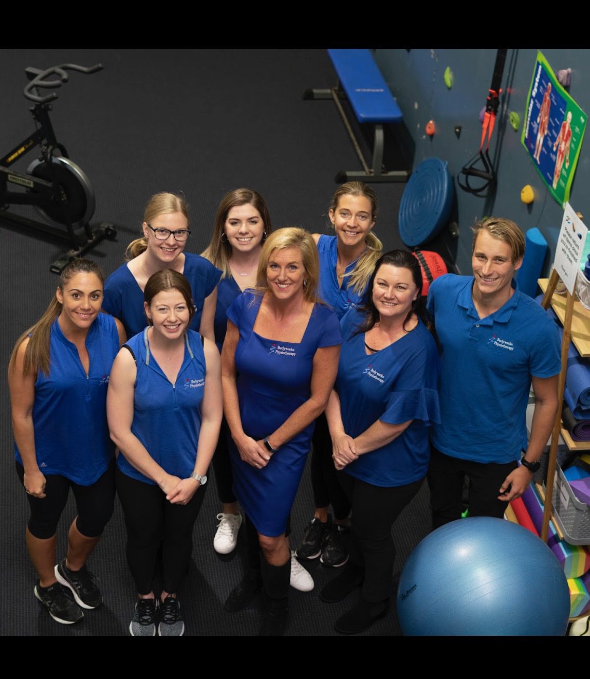 Body works Warriwood Physio team, looking up.